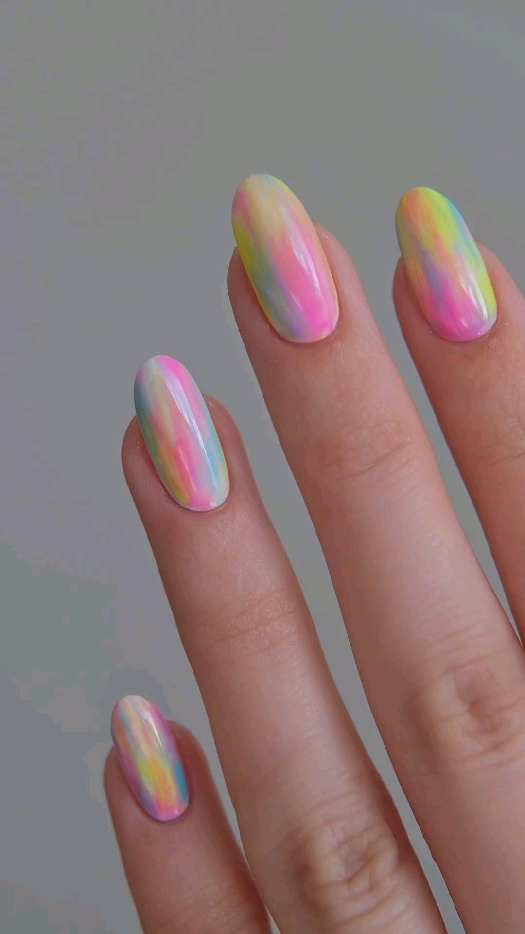 10 Stunning Jelly Nails Designs You Need to Try This Season! - 4. Tie-Dye Fun 1