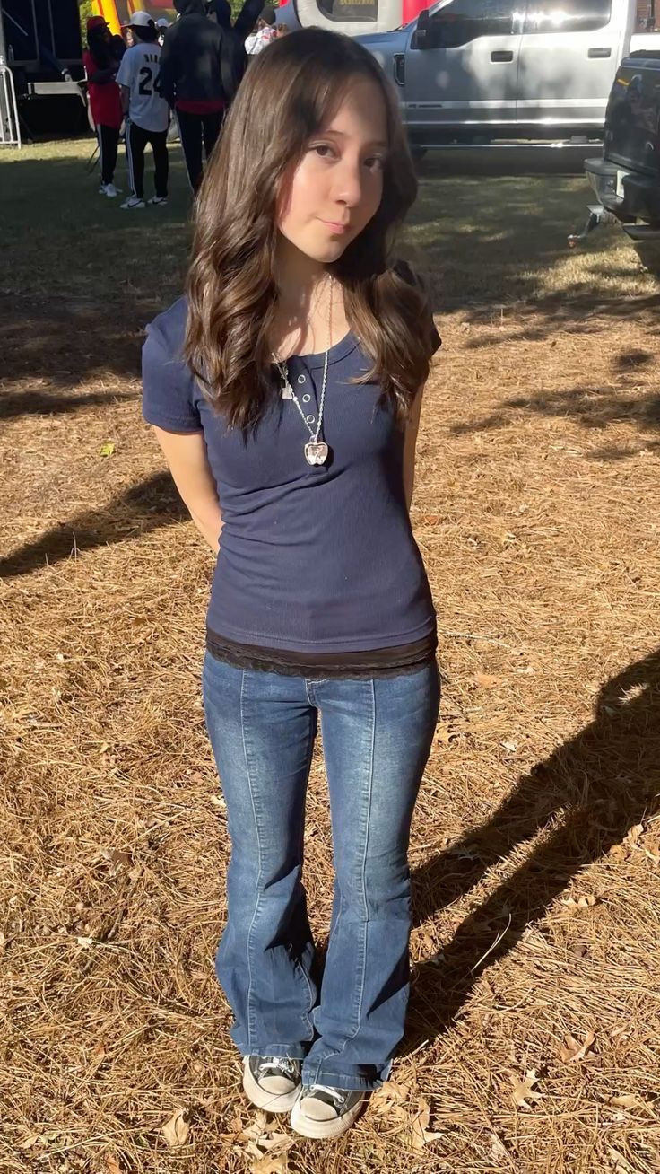 8 Chic Spring Outfit Combos with Women Jeans That Will Make You Stand Out! - 6. Striped Top and Flare Jeans 1