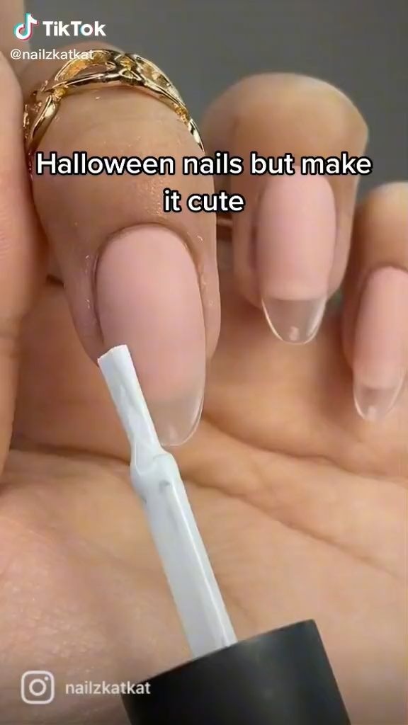 10 Simple Halloween Nail Art Ideas: Cute Ghost Nails, Spooky Designs & More - 10. Easy Sticker and Decal Halloween Nails 1
