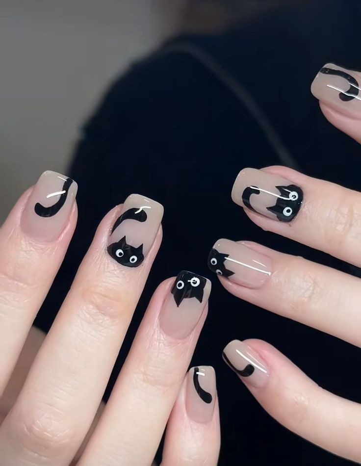 10 Simple Halloween Nail Art Ideas: Cute Ghost Nails, Spooky Designs & More - 2. Tiny Black Cats and Crescent Moons 1