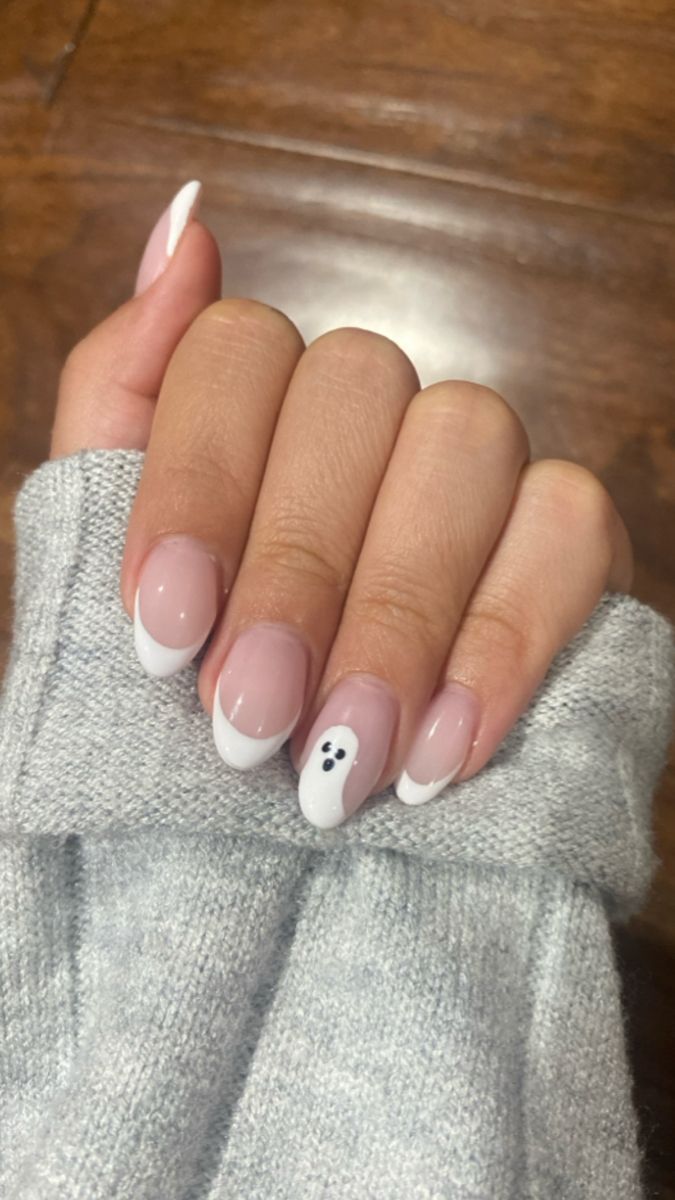 10 Simple Halloween Nail Art Ideas: Cute Ghost Nails, Spooky Designs & More - 5. Ghost Face French Tips 1