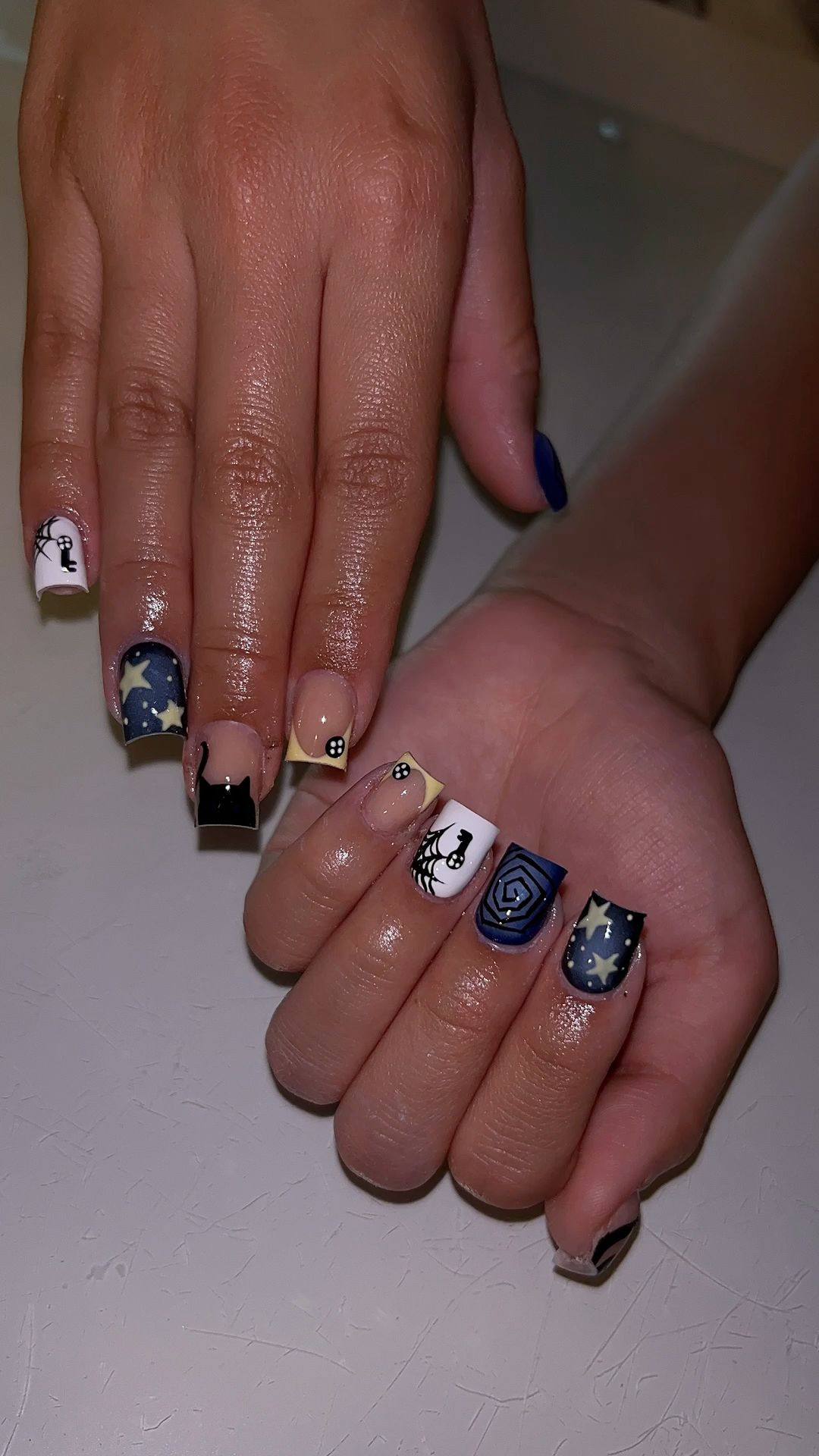 10 Simple Halloween Nail Art Ideas: Cute Ghost Nails, Spooky Designs & More - 9. Mix-and-Match Short Halloween Nails 1